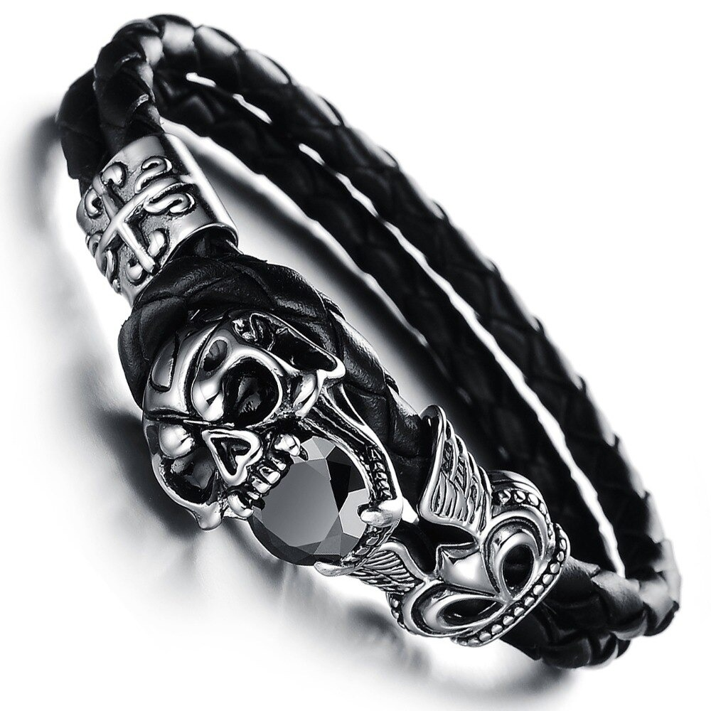 Stylish black PU leather bracelet with skull charm and vintage stainless steel accents, perfect for gothic fashion.