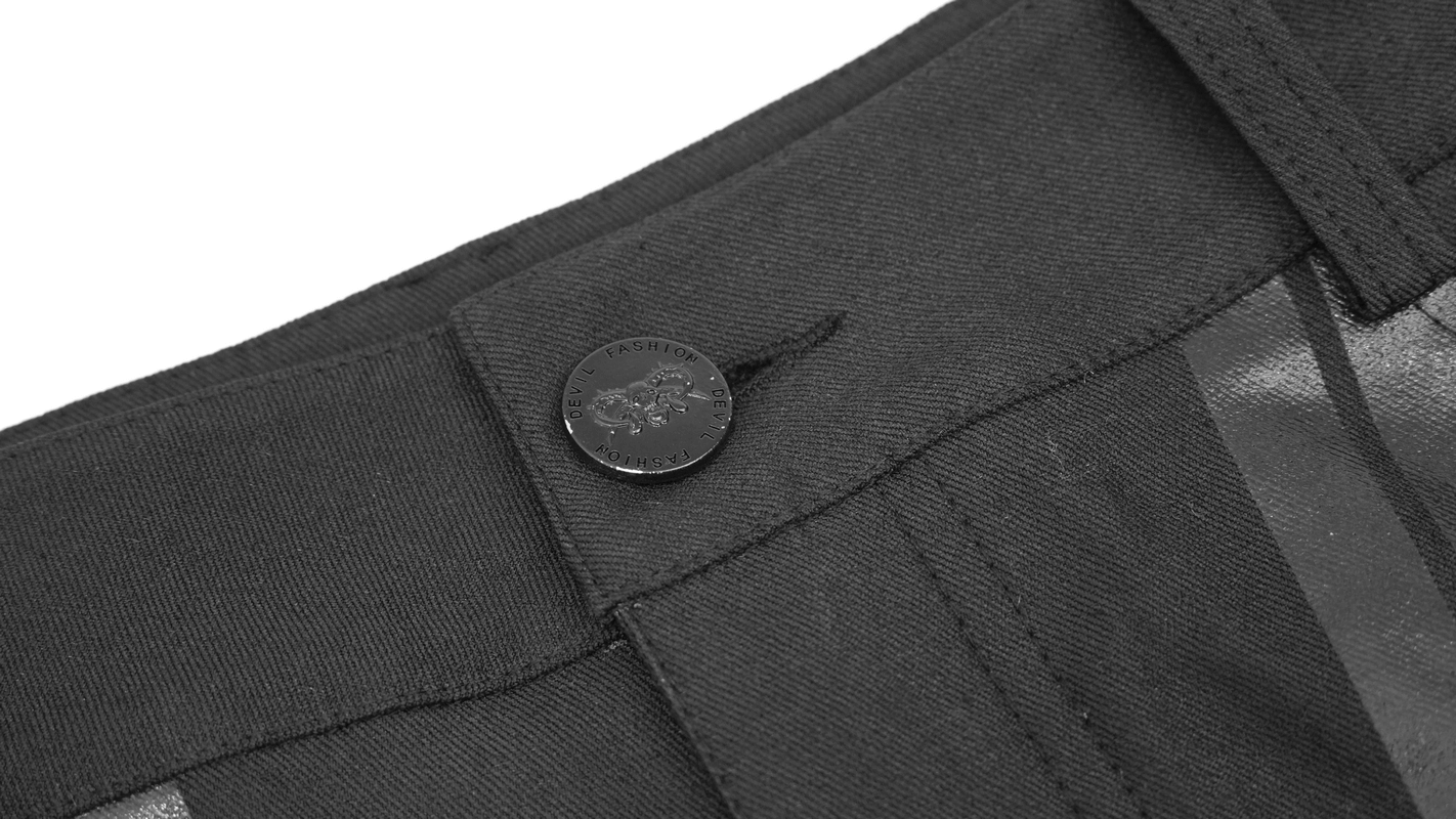 Close-up of black cyberpunk pants waistband showcasing stylish button detail.