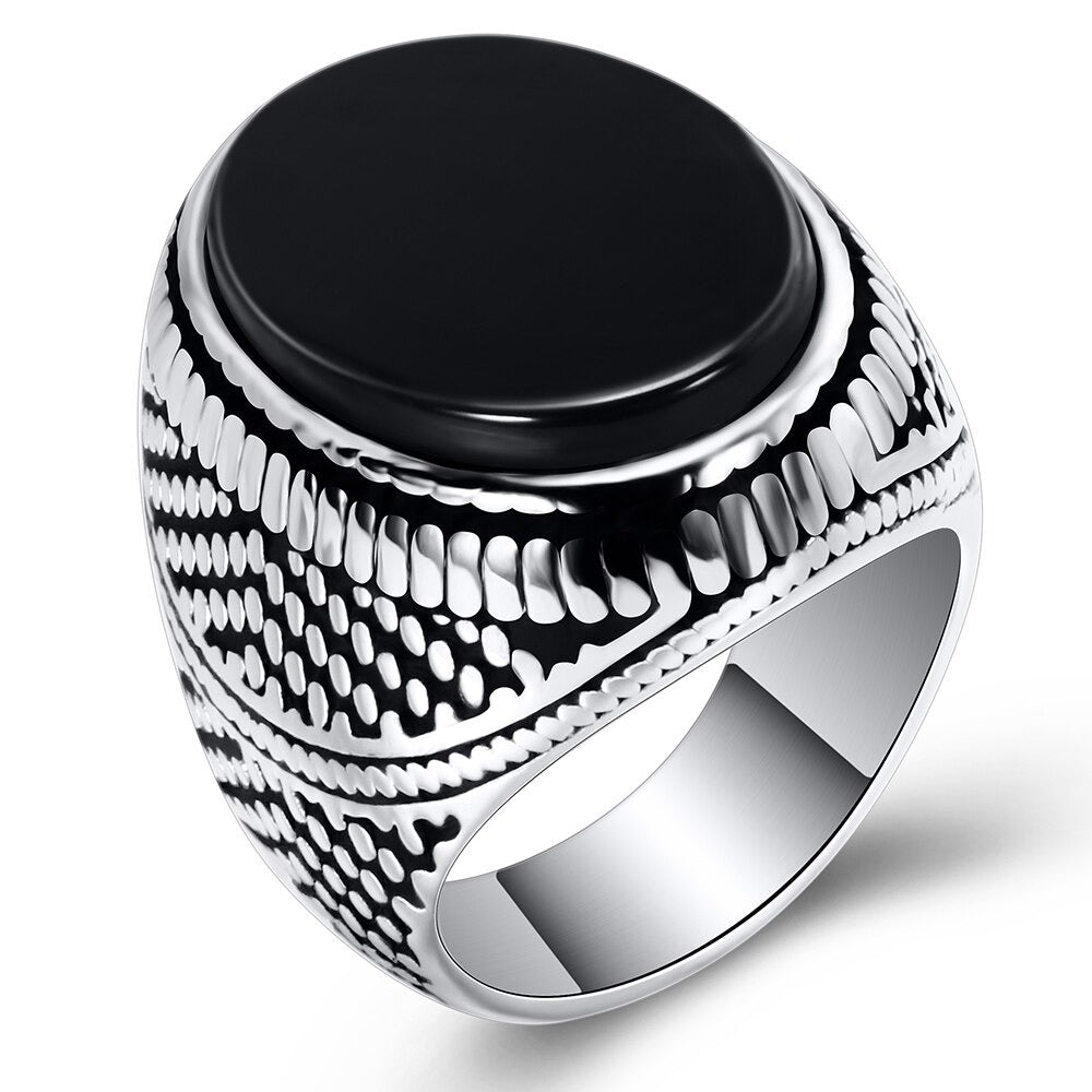 Men's vintage silver ring with black stone, 316L stainless steel, hypoallergenic, perfect for weddings.