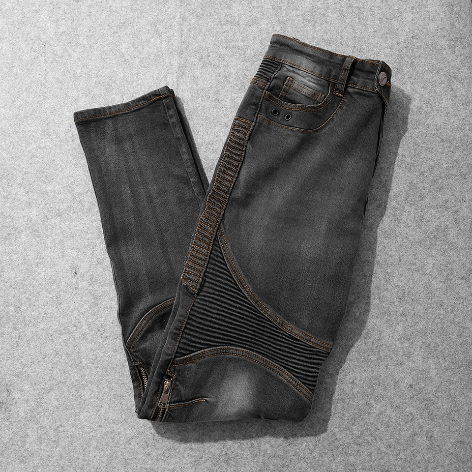 Men's biker style slim jeans in vintage grey with unique stitching and fitted cut for a stylish look.