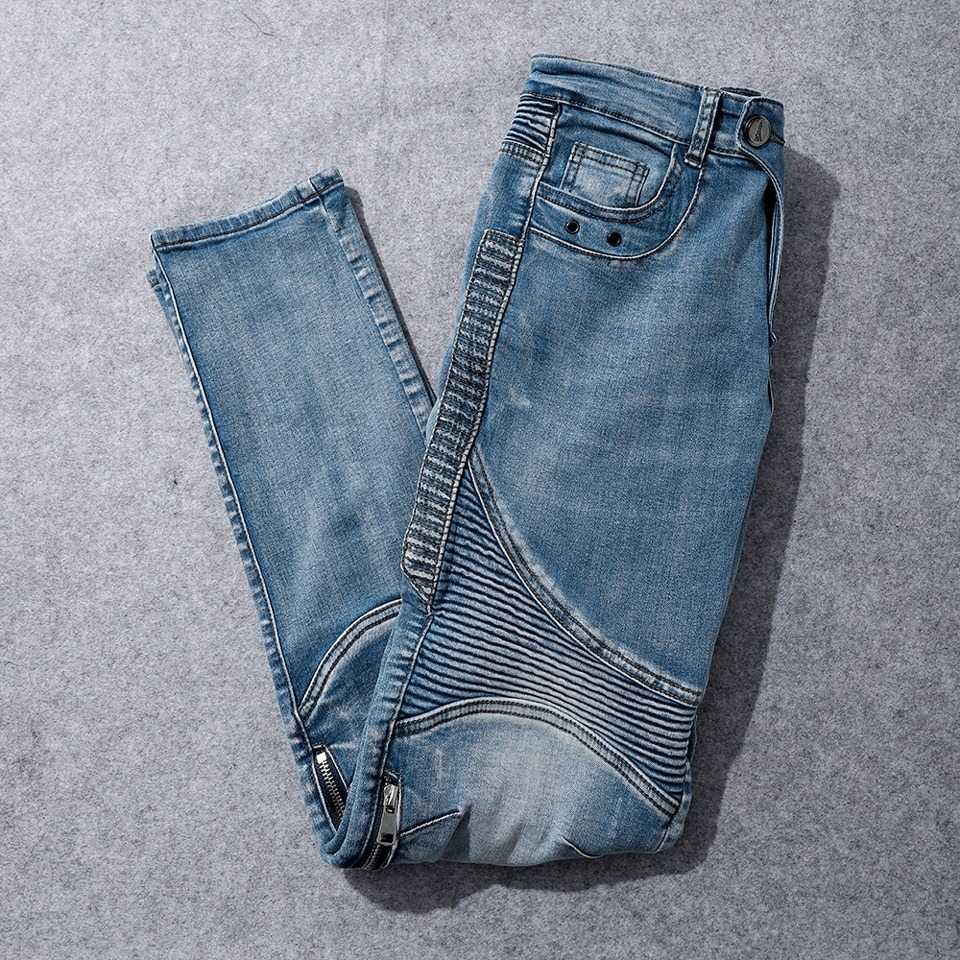 Men's biker style slim jeans in faded blue with stylish design and fitted cut.