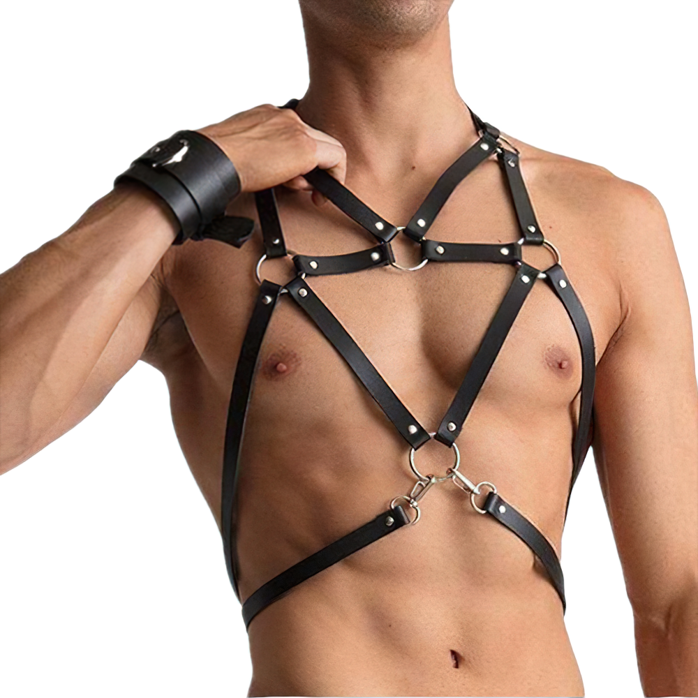 Men's sexy PU leather adjustable harness showcasing punk style with silver fittings on a model's torso.
