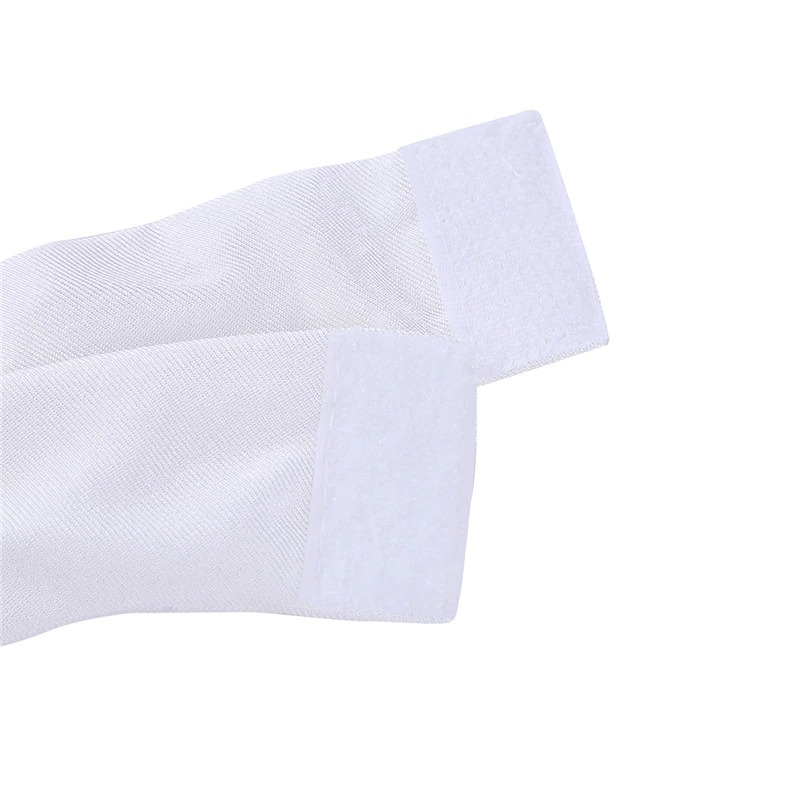 Close-up of white fabric straps with velcro fasteners, ideal for costume accessories.