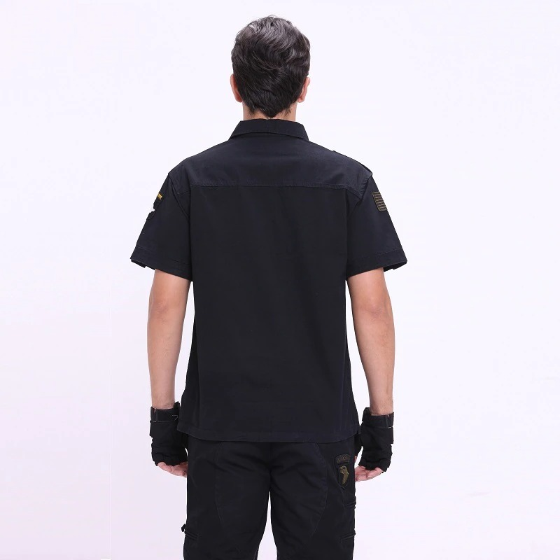 Men's short sleeve black military shirt seen from the back, showcasing a stylish tactical design.