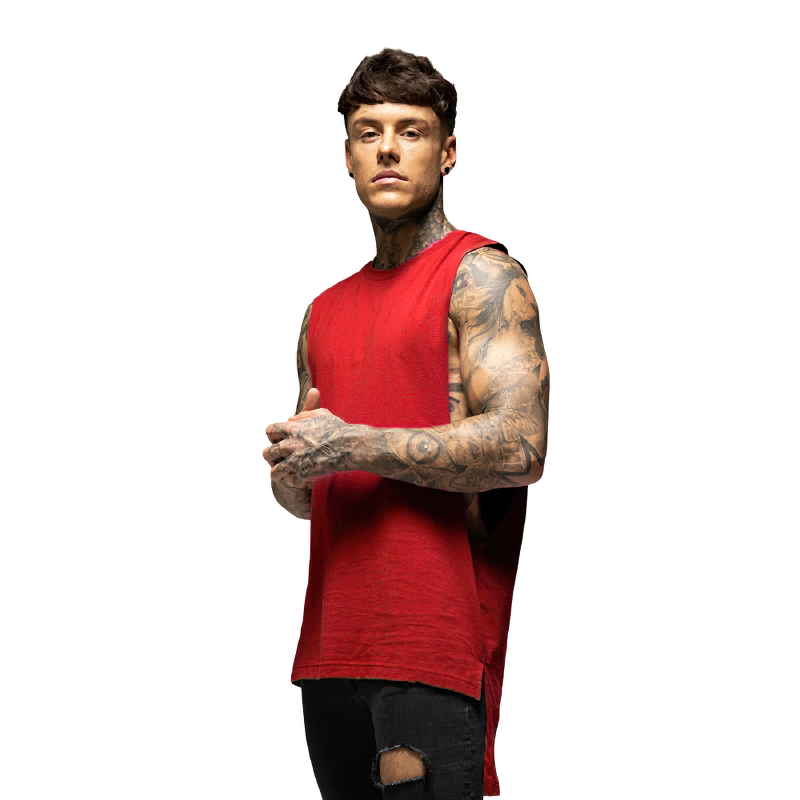Man in a red sleeveless tank top showcasing sporty style and comfort for bodybuilding and workouts.
