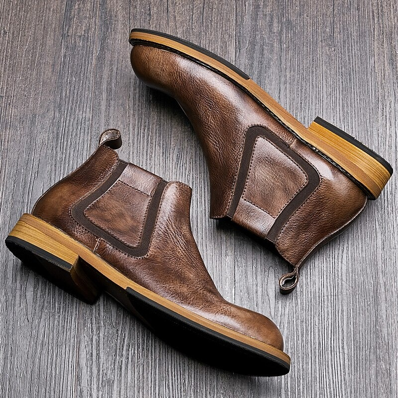 Men's soft leather ankle boots in brown, featuring a modern design and casual style, perfect for alternative fashion.