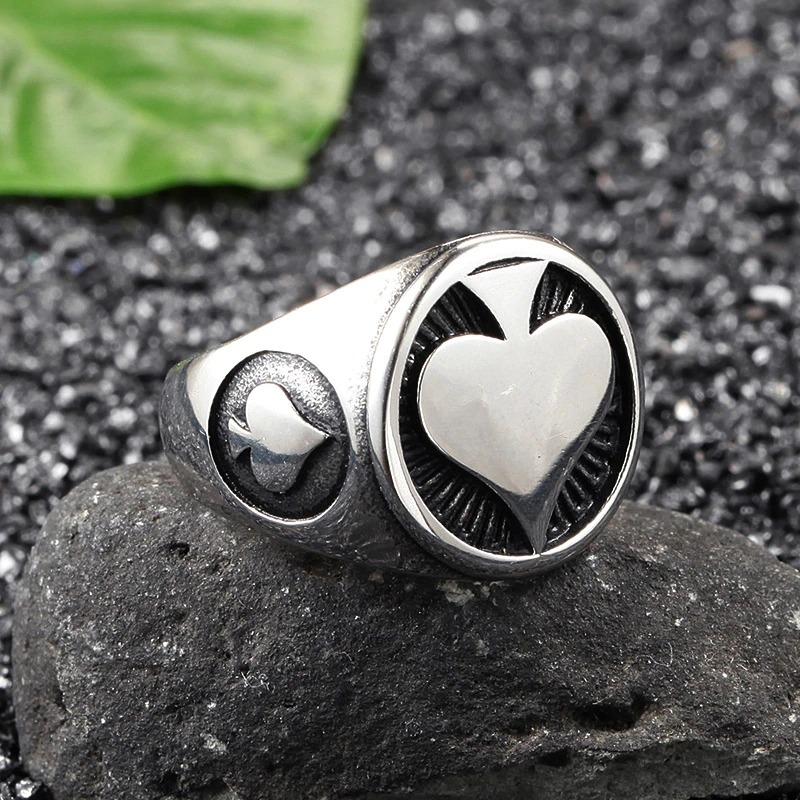 Men's vintage stainless steel ring with spade designs, perfect for rock style outfits.
