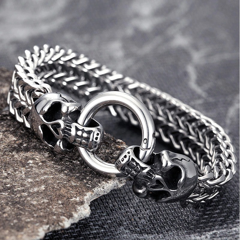 Men's vintage stainless steel skull bracelet with unique lock, perfect punk jewelry accessory for fashion-forward individuals.