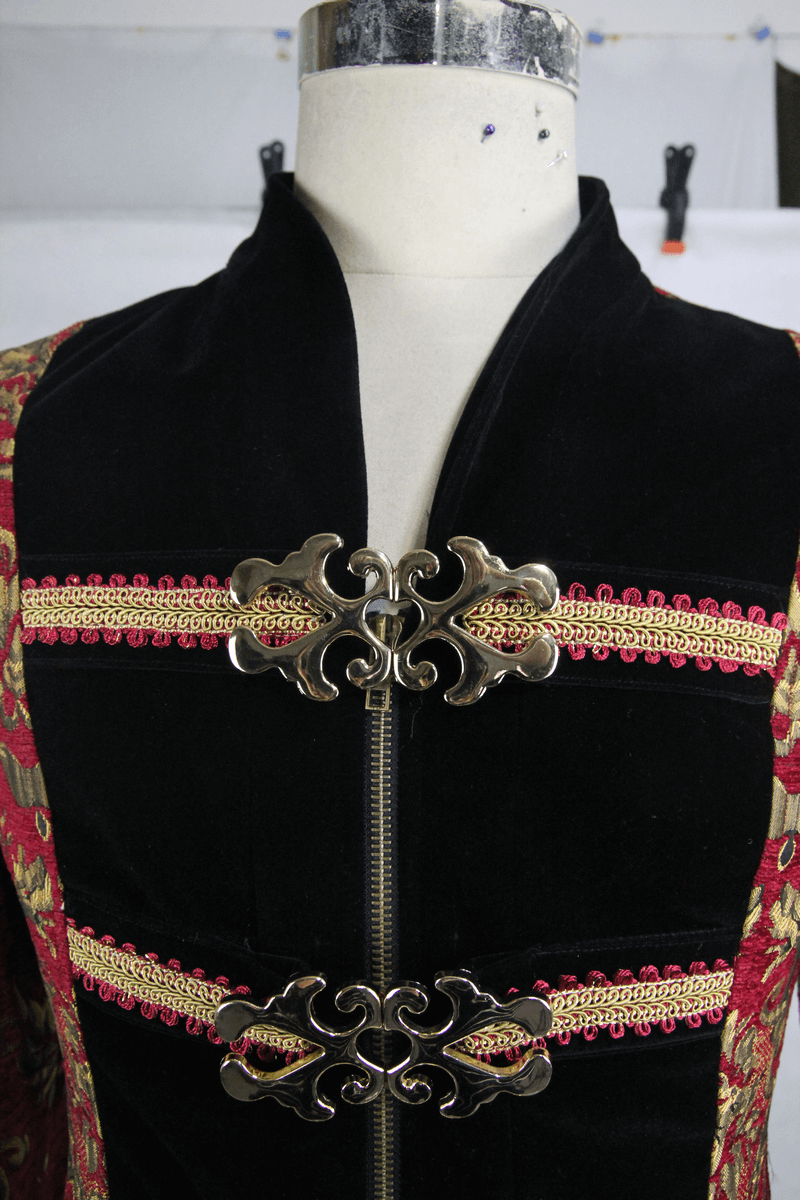 Close-up of the intricate design and gold clasps on a Gothic Steampunk Men's coat, showcasing its unique embroidery.
