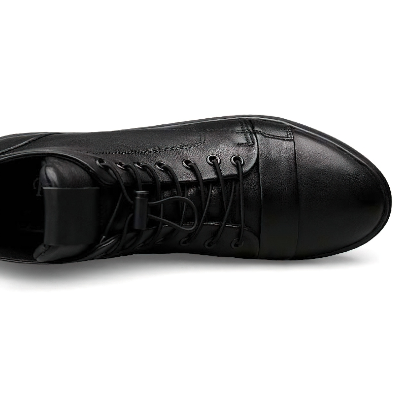 Men's black leather ankle boots with laces, modern casual style for comfort and durability.