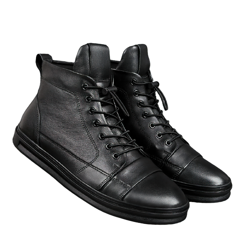 Men's stylish black leather ankle boots with flexible soles for casual wear and comfort.