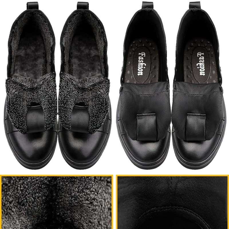Stylish black leather ankle boots with cozy fur lining and bow detail. Perfect for casual and warm winter wear.
