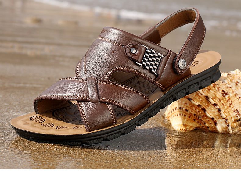 Men's summer leather sandals on a beach, perfect for casual outings and aesthetic dress, featuring non-slip soles.
