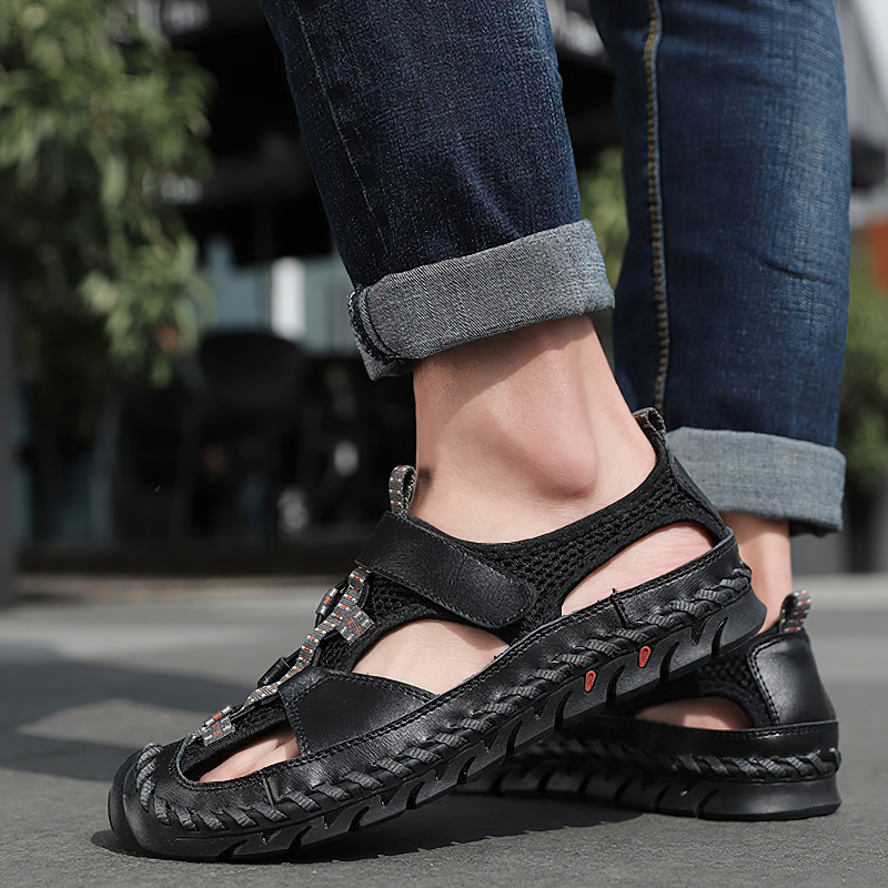 Men's summer leather sandals featuring non-slip outsole, casual style, perfect for warm weather outings.