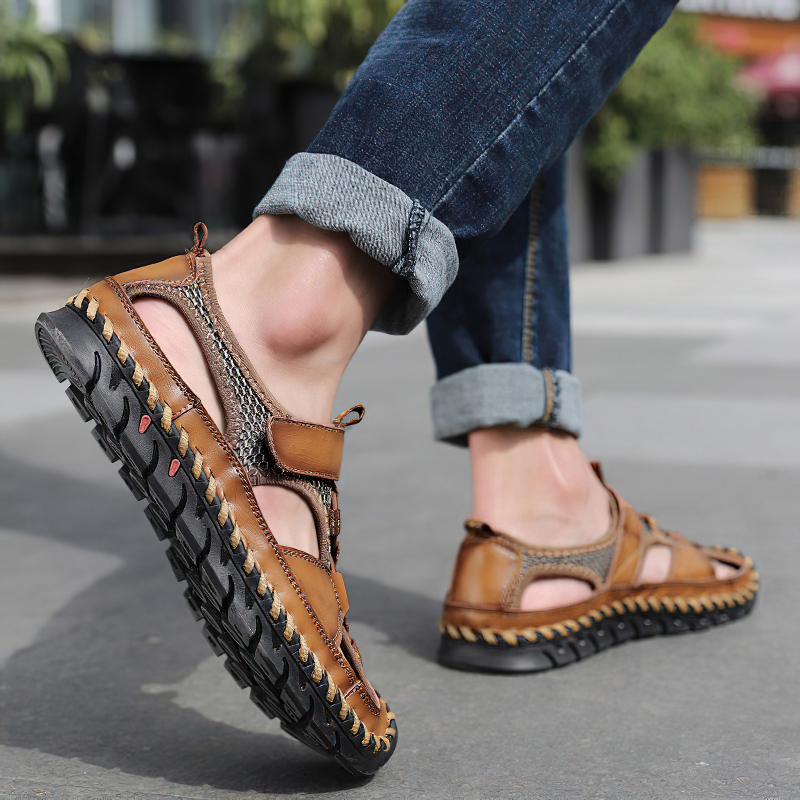 Stylish men's summer leather sandals featuring a non-slip outsole, perfect for warm days and casual outings.