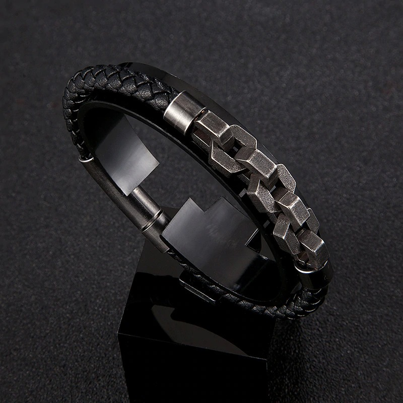 Men's vintage genuine leather bracelet with stainless steel accents in rock style for a bold look.
