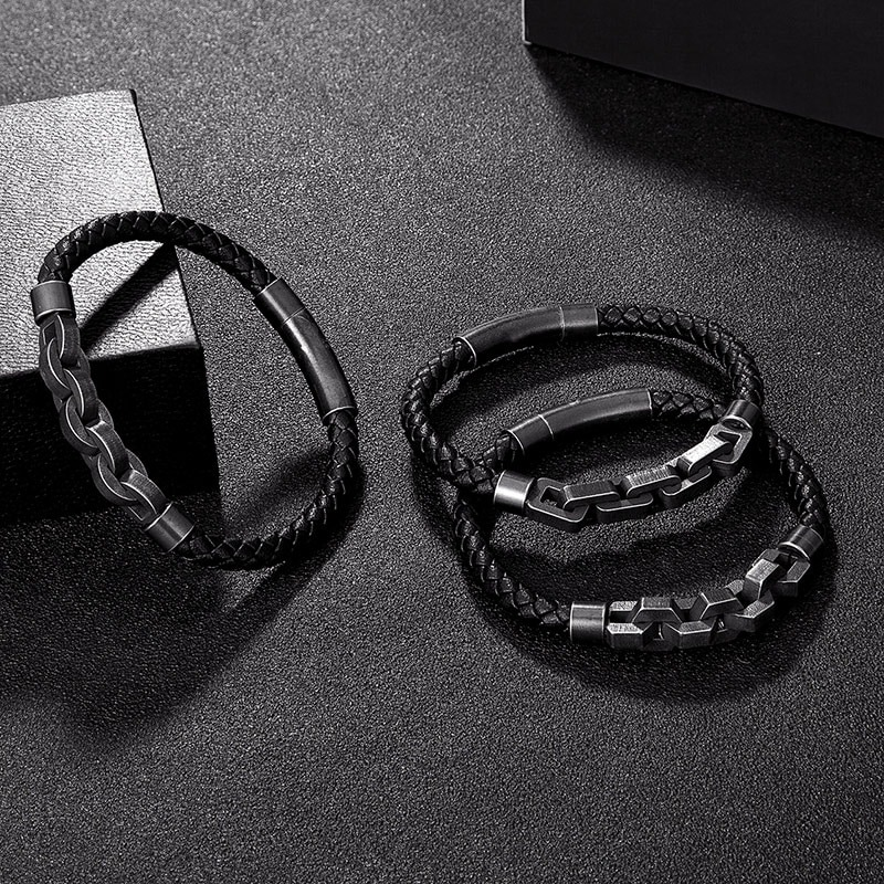 Stylish men's vintage leather bracelets in rock style, featuring braided and chain designs, perfect for trendy outfits.