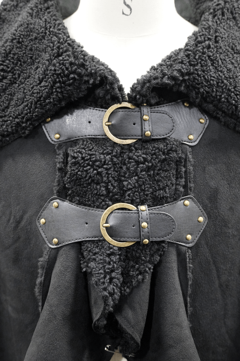 Close-up of a black asymmetrical cloak with buckled straps and a soft, textured collar, perfect for gothic fashion.