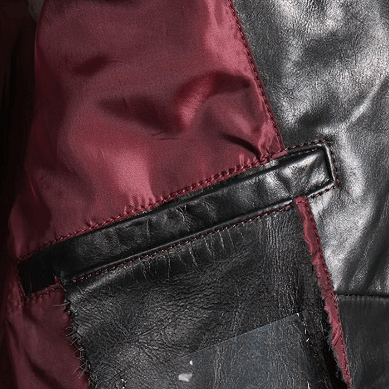 Close-up of the interior lining and pocket details of a Men's Waxed Horsehide Motorcycle Jacket.
