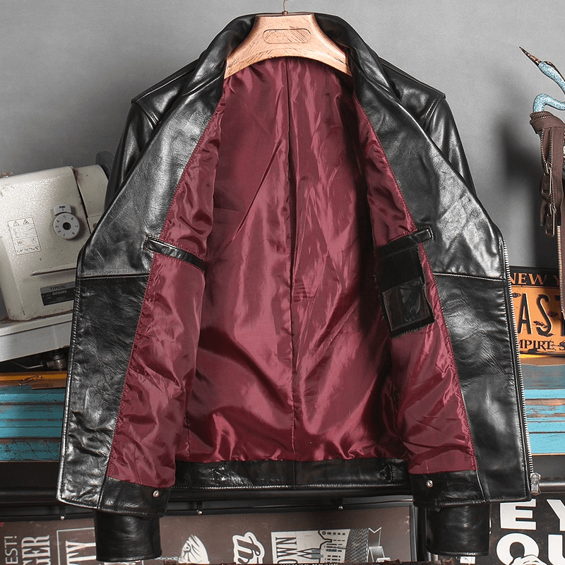 Interior view of men's waxed horsehide motorcycle jacket showcasing stylish cotton lining and pockets.