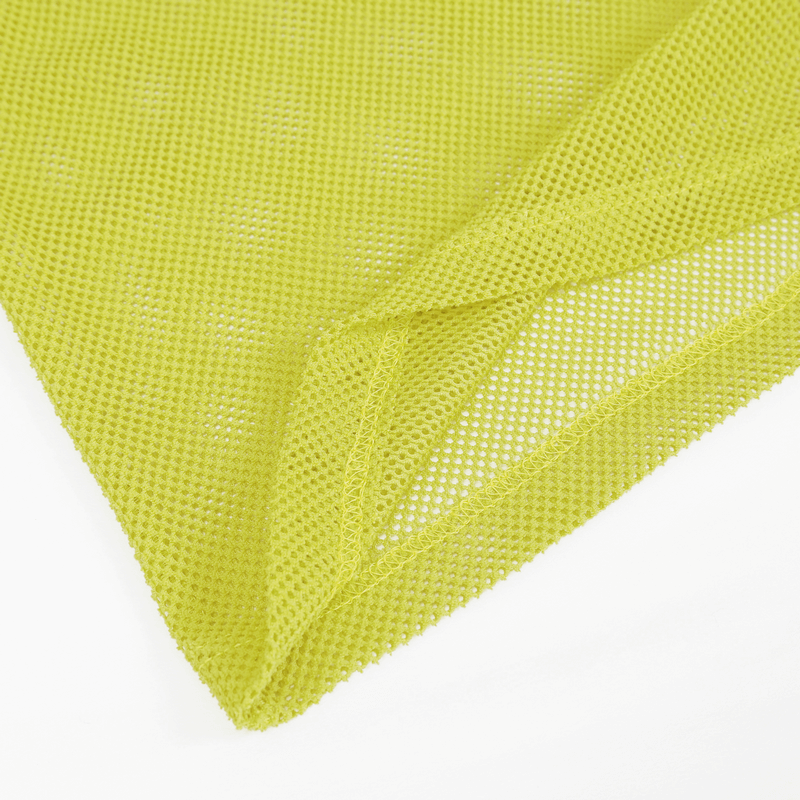 Close-up of bright yellow mesh fabric, ideal for trendy sleeveless tops and alternative fashion styles.