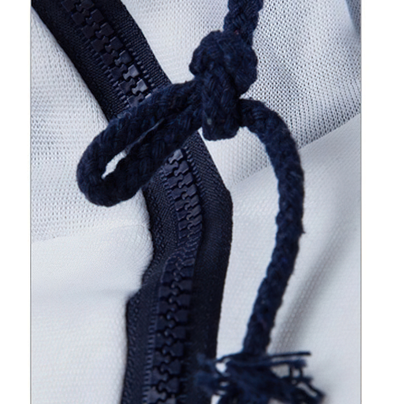 Close-up of men's zipper hoodie showing quality zipper detail and decorative knot for stylish casual wear.