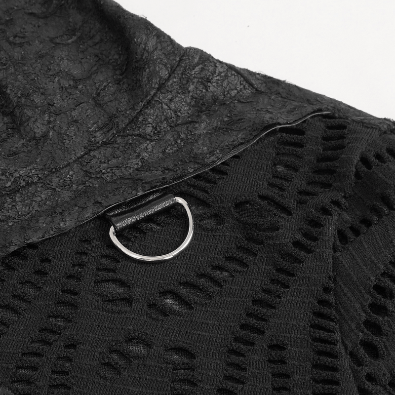 Close-up of gothic mesh asymmetrical top showing black fabric texture and silver sleeve garter ring detail.