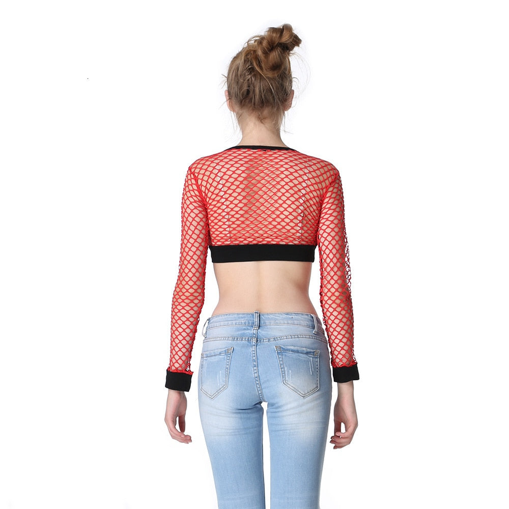 Back view of a women's red mesh fishnet long sleeve crop top, paired with light blue jeans, showcasing an alternative fashion style.