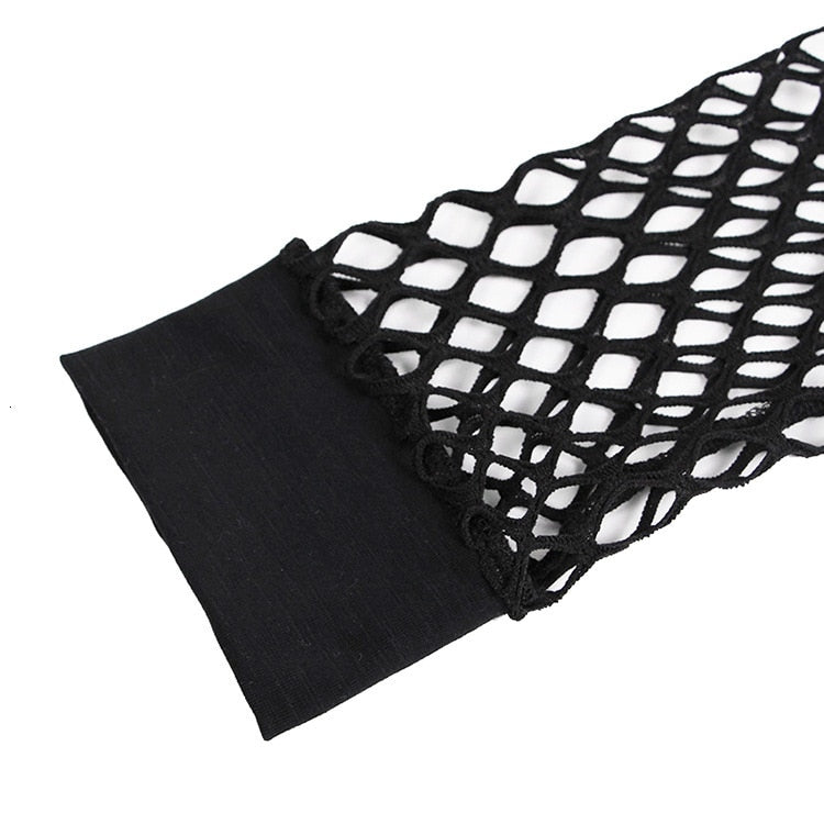 Close-up of black mesh fishnet fabric, showcasing hollow net design and soft solid hem for a stylish crop top.