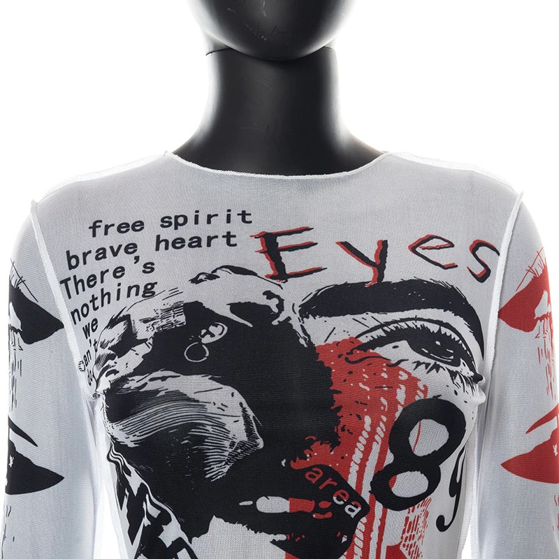 Stylish women's mesh crop top with eye-catching graphic print and long sleeves in alternative fashion.