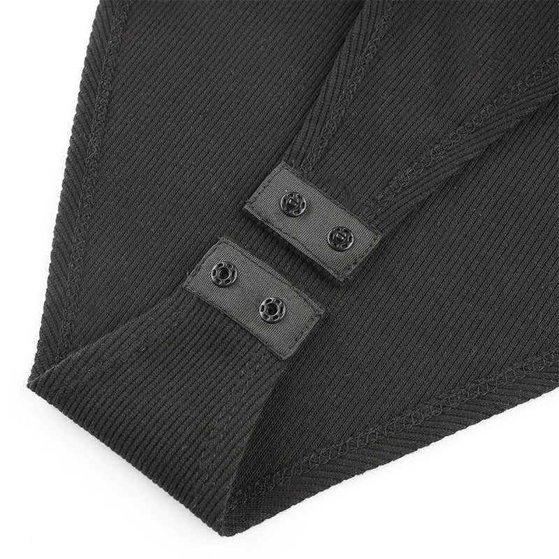 Close-up of the button detail on a black mesh patchwork bodysuit for women.