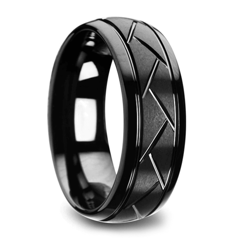 Unisex black metal ring with zigzag pattern, cool retro jewelry for men and women.