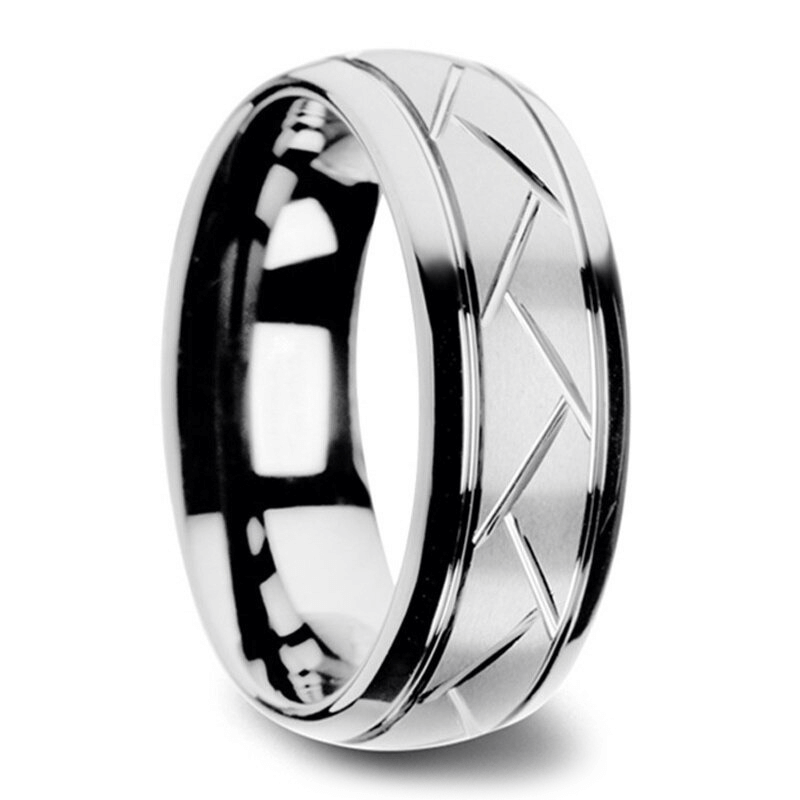 Unisex metal ring in silver with a zigzag pattern, perfect for stylish men and women seeking cool retro jewelry.