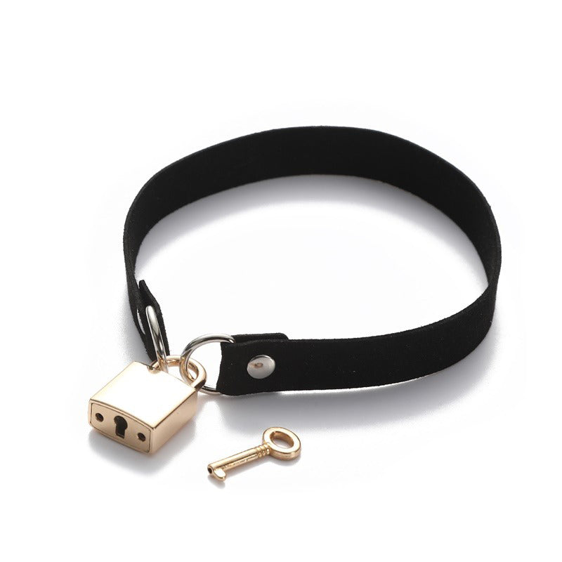 Unisex metallic lock choker collar on black velvet, featuring a gold lock and key, perfect for rock or goth outfits.