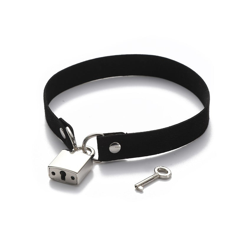 Unisex black velvet choker necklace featuring a metal lock and key, perfect for rock and goth outfits.