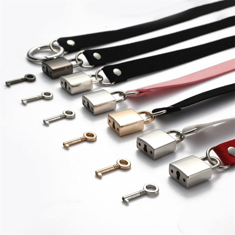 Collection of unisex metallic lock choker necklaces with keys on black and colored straps.