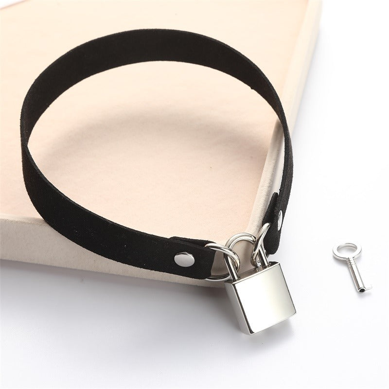 Unisex metallic lock choker collar on a soft black velvet strap, perfect for rock and goth outfits.