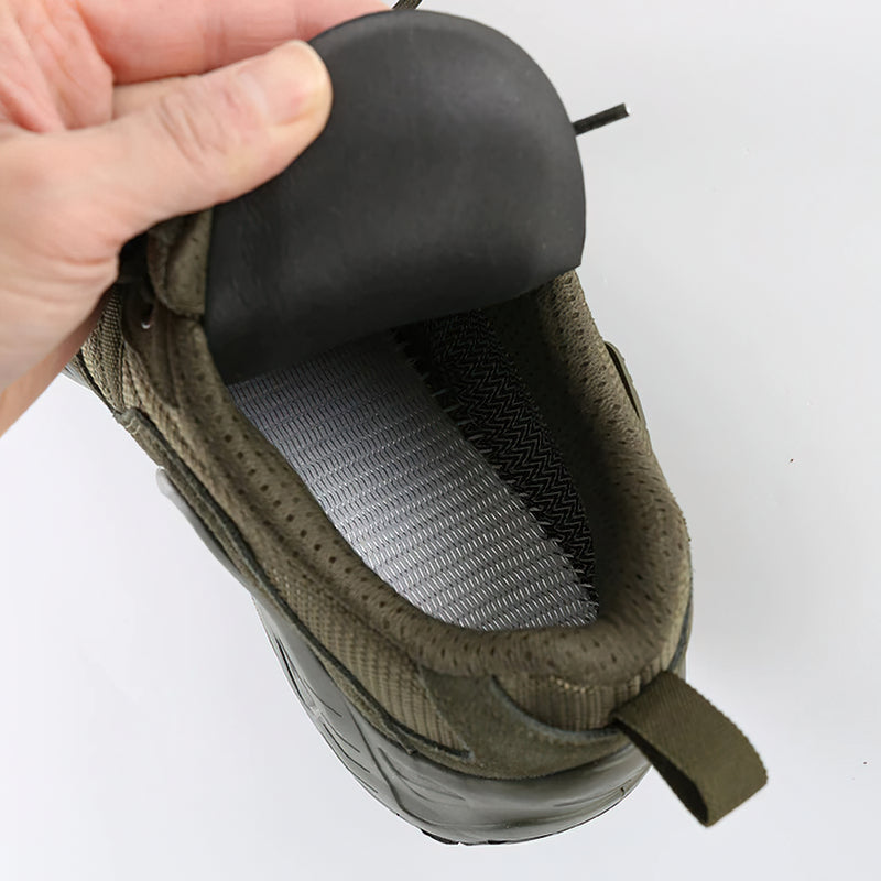 Interior view of olive green military combat shoe showcasing breathable mesh lining for comfort.