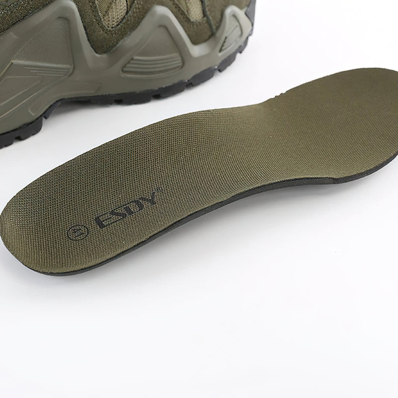 Close-up of the olive green insole from military combat shoes, showcasing breathable comfort and non-slip design.