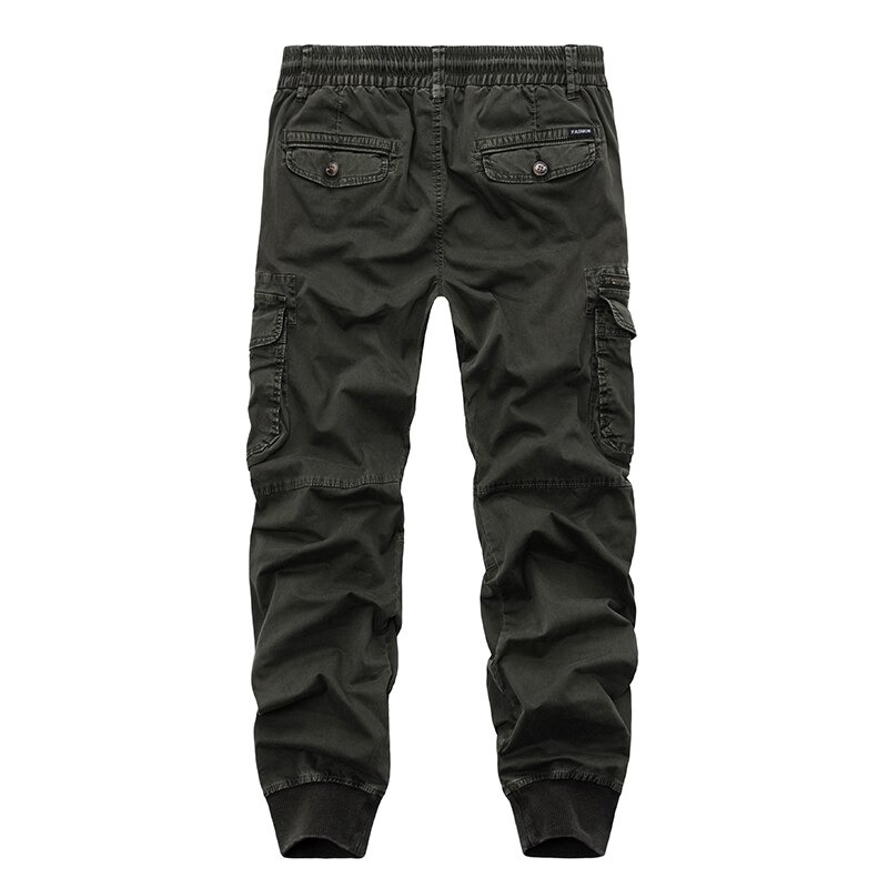 Military male jogger pants with pockets, elastic waist, perfect for streetwear in spring and autumn.