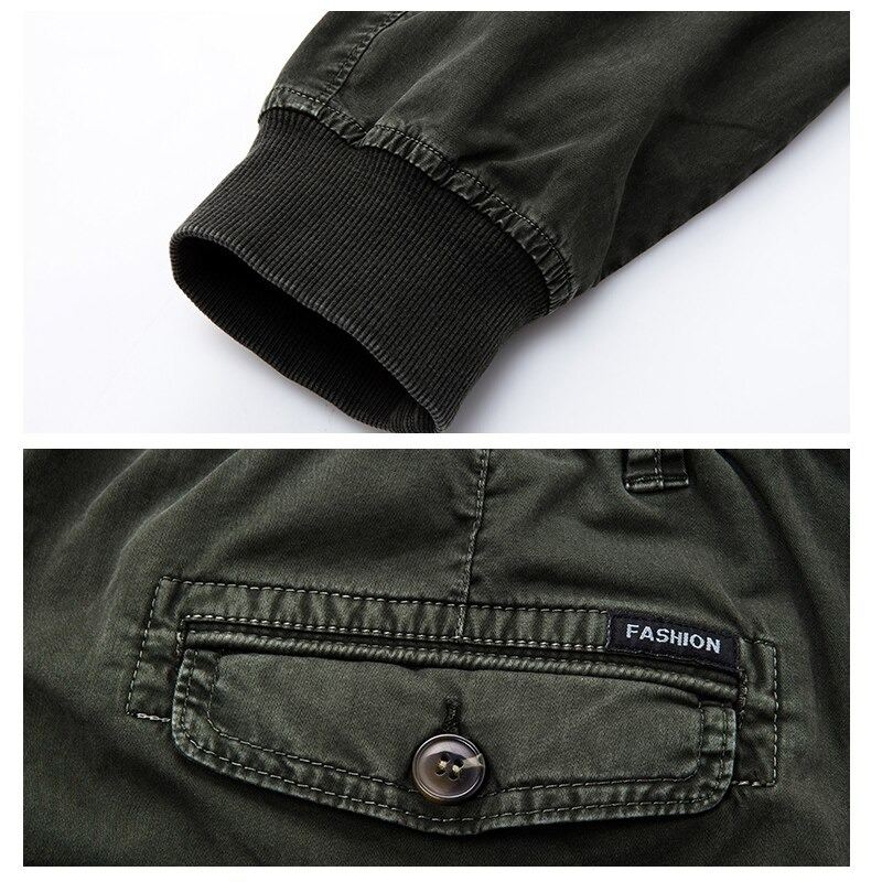 Detail view of military male jogger pants showcasing elastic waistband and stylish pocket with button.