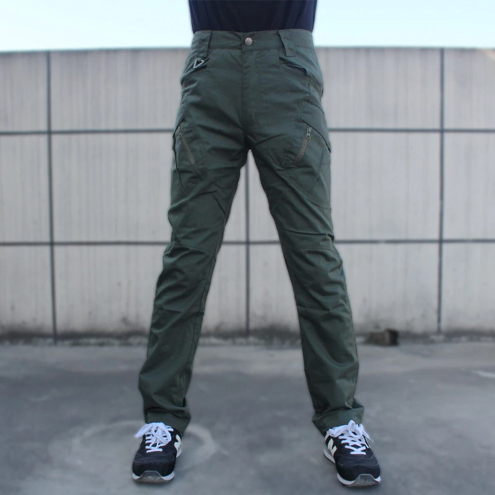 Men's military tactical cargo pants in green with multiple pockets, perfect for outdoor and multi-tasking needs.