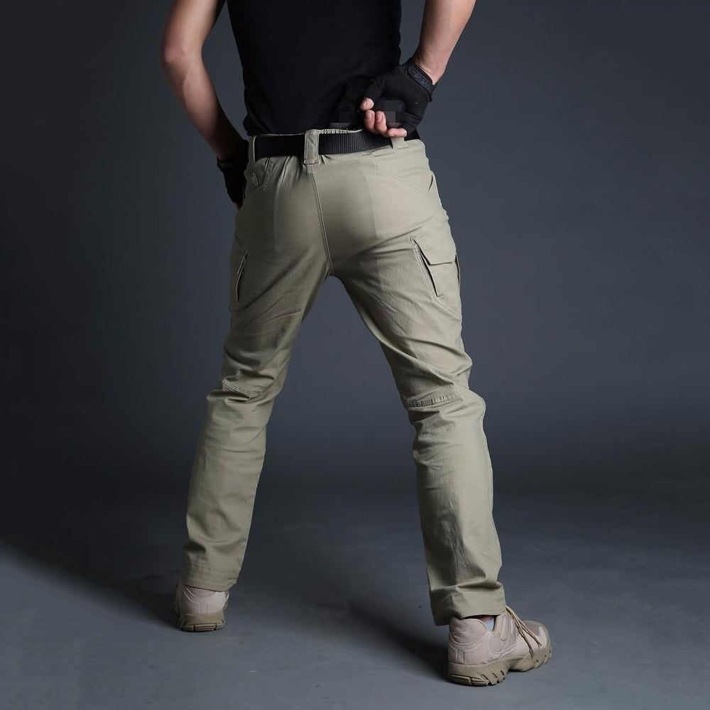 Men's military tactical cargo pants in khaki, showcasing numerous pockets for versatile use and stylish design.