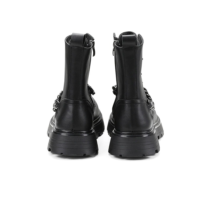 Black motorcycle boots with metal chains, thick soles, and stylish zipper detail, perfect for fashion-forward men.