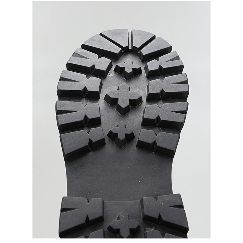 Thick-soled motorcycle boots featuring a rugged tread design for enhanced grip and durability.