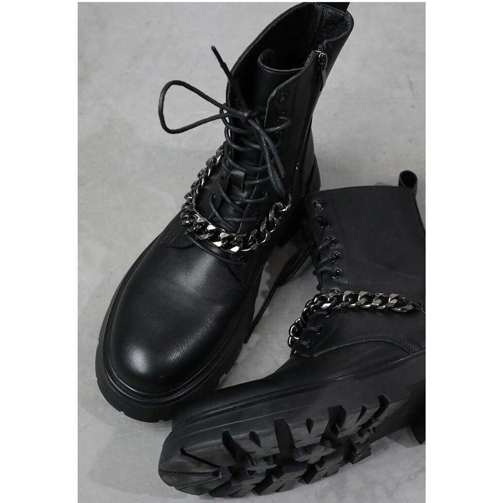 Men's motorcycle boots with metal chain, thick soles, and lace-up style, perfect for a punk fashion statement.
