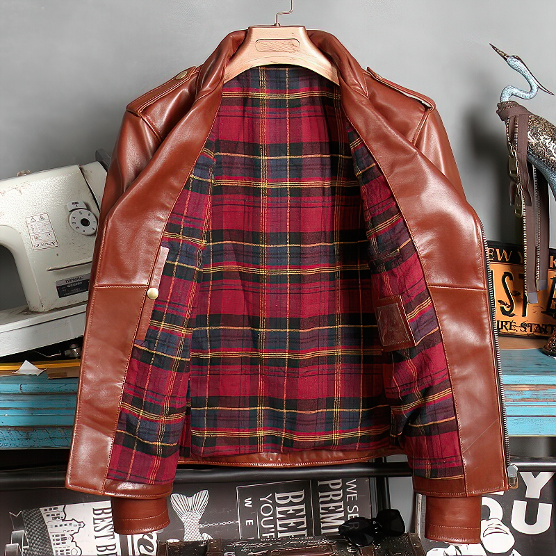 Brown leather biker jacket with plaid lining, perfect for classic rock style and comfort.