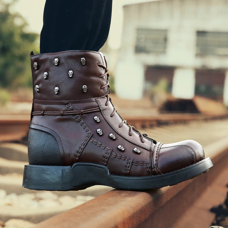 Men's genuine leather motorcycle combat boots featuring gothic skulls and stylish silver rivets.