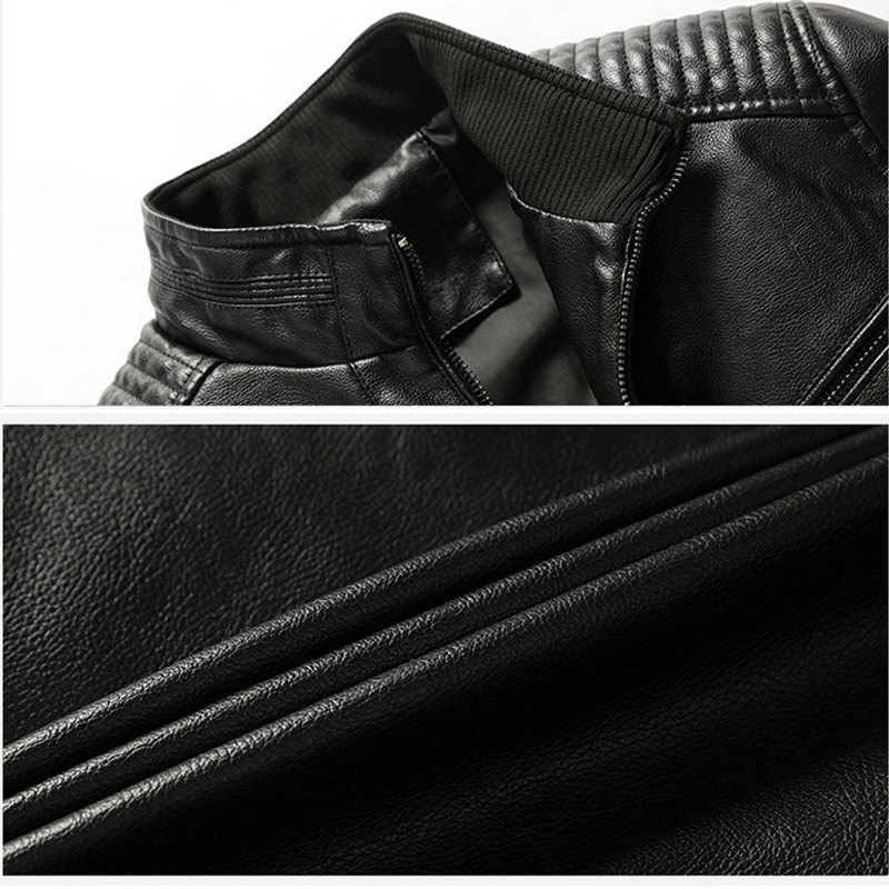 Close-up of a stylish black PU leather motorcycle jacket with turn-down collar and textured detailing.