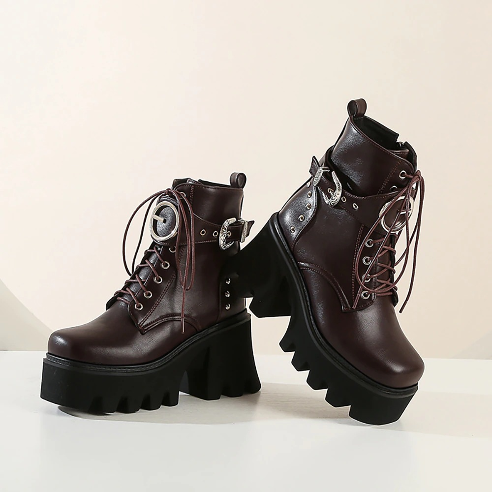 Fashionable women's ankle boots in dark brown with lace-up design and metal buckle, featuring sturdy high platform heels.